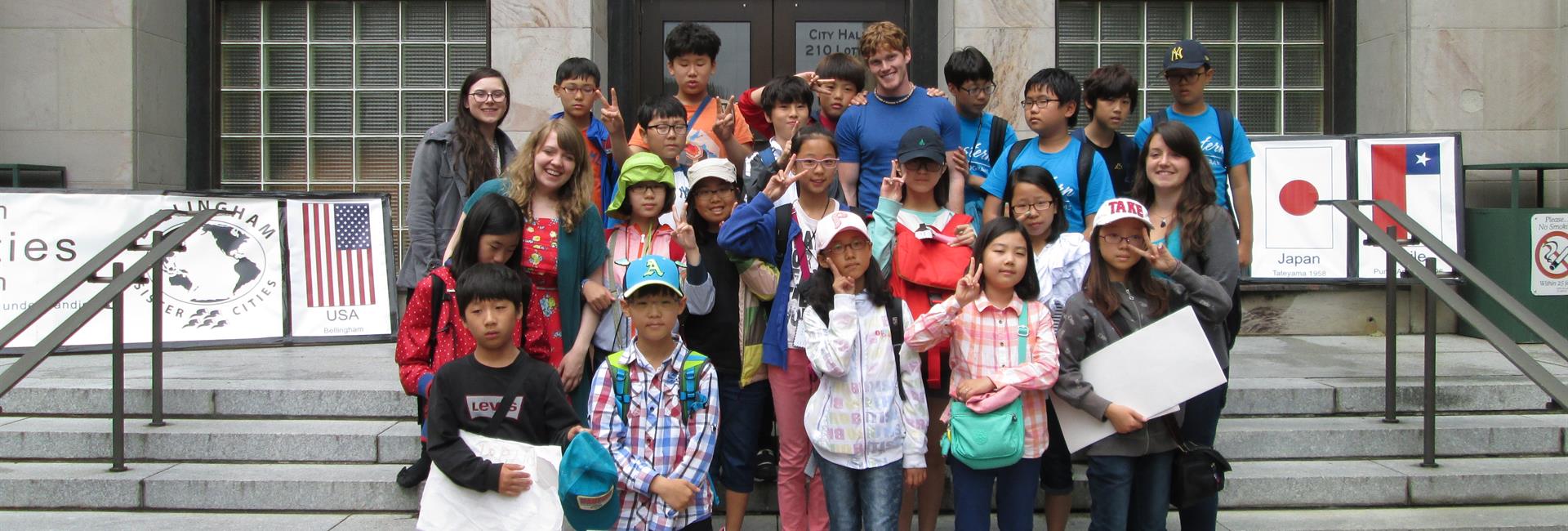 ​Visitors from Cheongju, South Korea, on the steps of City Hall<br> image